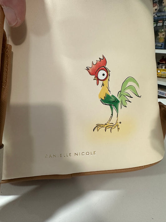 Danielle Nicole Moana with Pua and Hei Hei Backpack